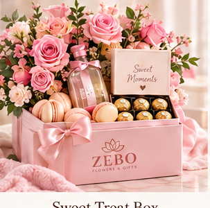 Sweet Treat gift box with pink roses, macarons, and chocolates